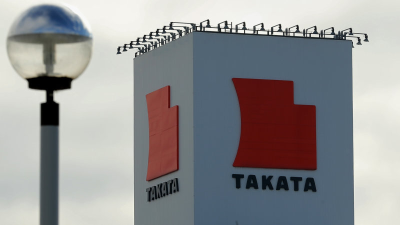 signage-for-takata-corp-are-displayed-at-the-companys-echigawa-plant-picture-id630000474.jpg