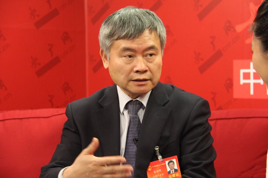 蔡继明.jpg